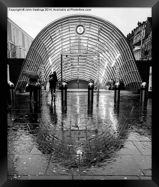  Symmetry in the rain Framed Print by John Hastings