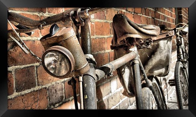  bikes and bricks Framed Print by Heather Newton