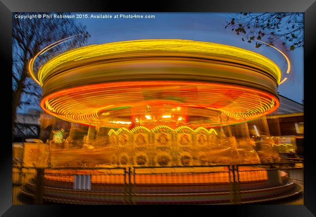  Roundabout at a fairground in London  Framed Print by Phil Robinson