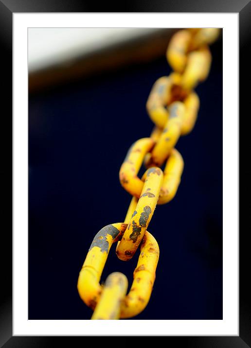 Yellow Chain on black boat Framed Mounted Print by Ivan Kovacs