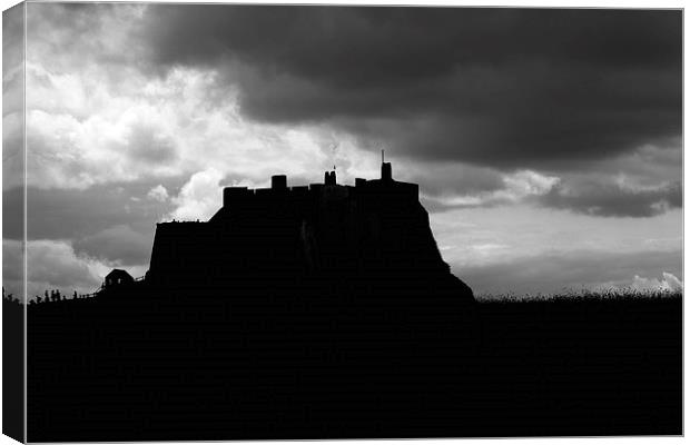  Lindifarne Castle at Holy Island in silhouette. Canvas Print by Ivan Kovacs