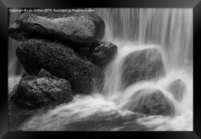 The splash at the bottom of the fall Framed Print by Lee Sutton