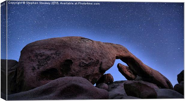  Arch Rock Under The Stars Canvas Print by Stephen Stookey