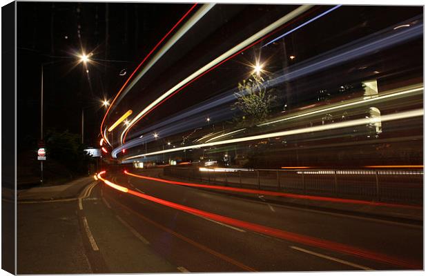 London Buses at night Canvas Print by Peter Hart