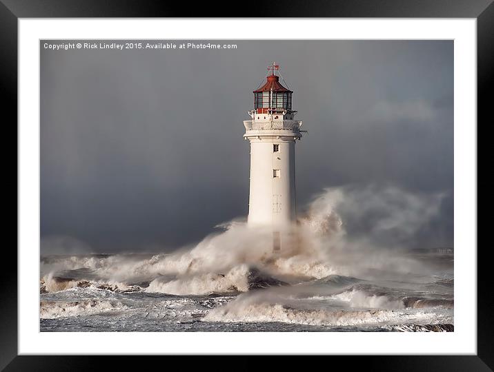 Lighthouse in a storm Framed Mounted Print by Rick Lindley