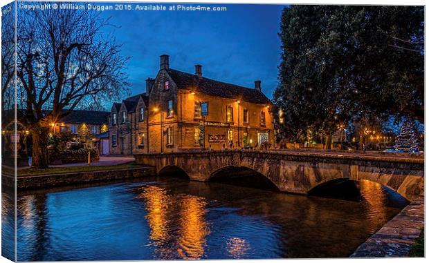 Bourton on Water ,Cotswolds. Canvas Print by William Duggan