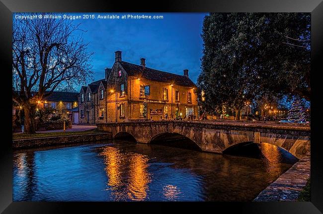 Bourton on Water ,Cotswolds. Framed Print by William Duggan