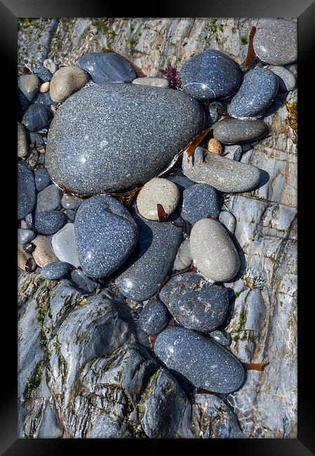  Smooth and shiny, Pebbles at Porth y Rhaw, Wales Framed Print by Andrew Kearton