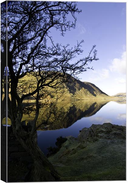 Reflections of Crummock Water Canvas Print by James Lavott