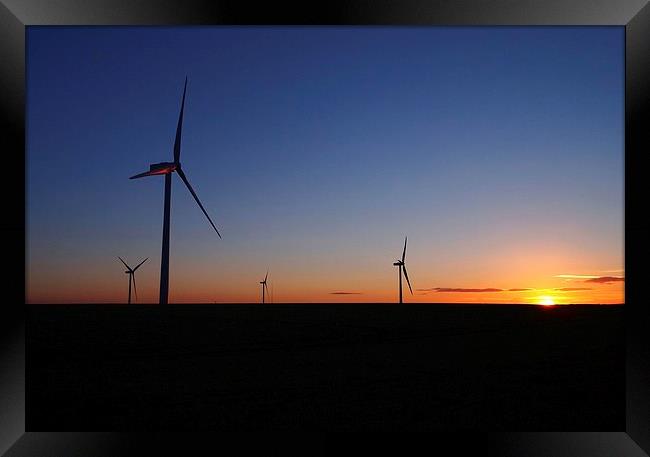  Wind turbines at sunset Framed Print by Gerald Robinson