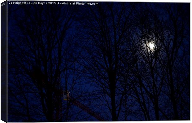 The moon and a crane, at night, through the trees. Canvas Print by Lauren Boyce