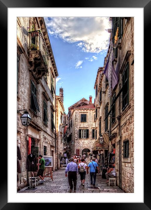 Exploring Dubrovnik Framed Mounted Print by Tom Gomez