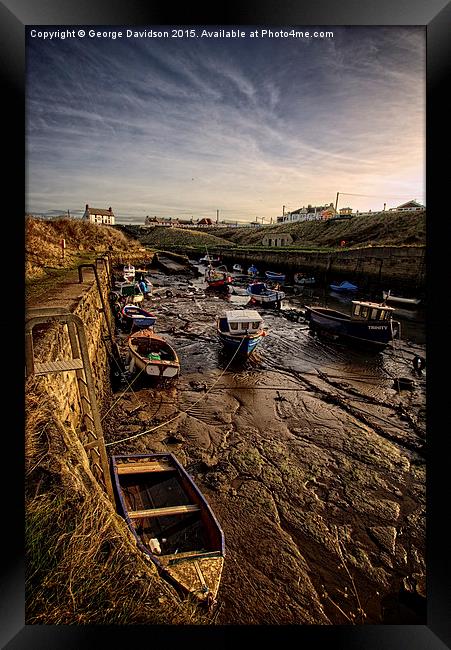 A Surreal Scene of Abandoned Boats Framed Print by George Davidson