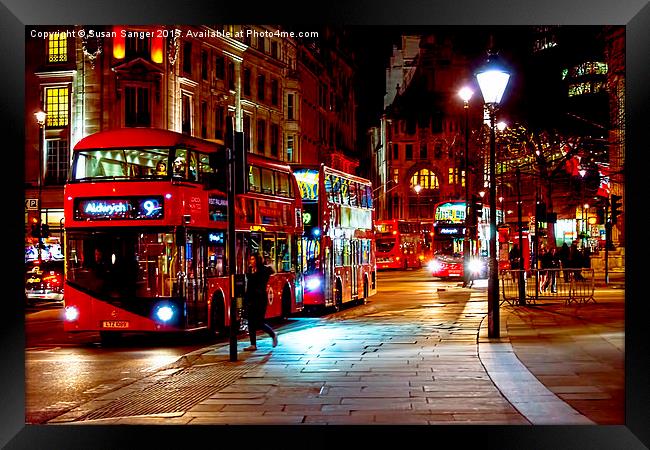  London Busses at Trafalgar Square at night Framed Print by Susan Sanger
