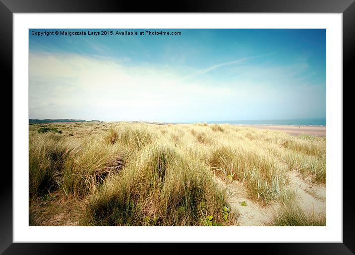 Beautiful beach with sand dunes and blue sky in UK Framed Mounted Print by Malgorzata Larys