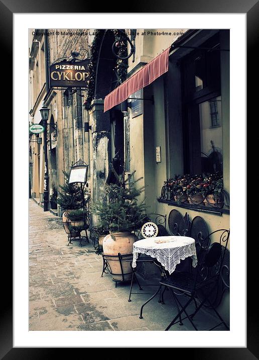 Street cafe in the old town in Krakow Framed Mounted Print by Malgorzata Larys