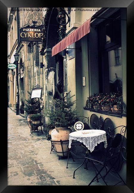 Street cafe in the old town in Krakow Framed Print by Malgorzata Larys