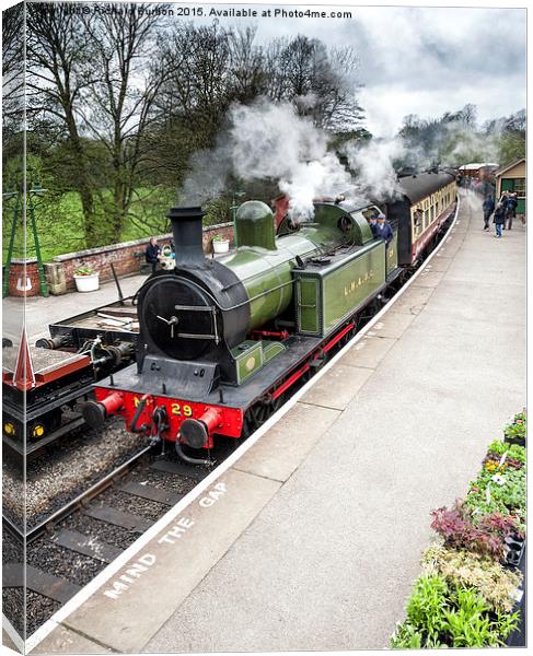  A steam train arriving in Pickering station Canvas Print by Richard Burdon