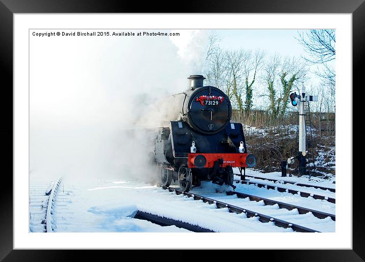  Steam locomotive 73129 in snow. Framed Mounted Print by David Birchall