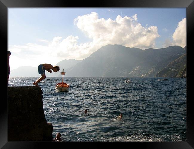 Boys playing on the Amalfi Coast Framed Print by Jay Rajdev