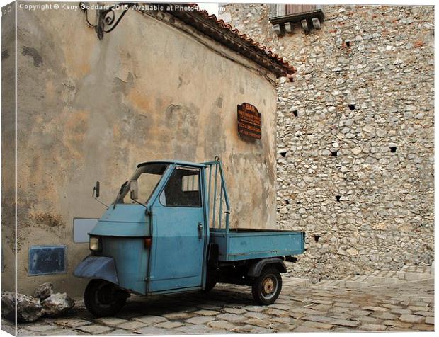 Ancient Italian Piaggio parked by the bar ! Canvas Print by Kerry Goddard