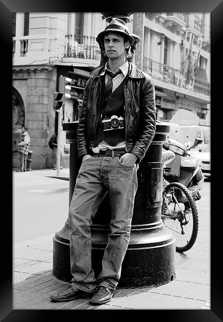 Man with vintage camera Framed Print by Gabor Pozsgai