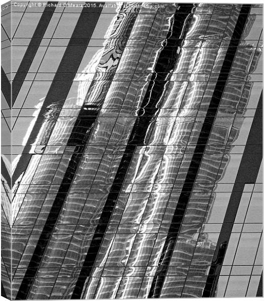 Reflection of part of the Burj Khalifa, in an offi Canvas Print by Richard O'Meara