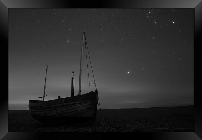  A wooden boat under a starry sky Framed Print by Artem Liss