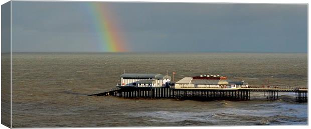  Rainbow over the pier Canvas Print by Gordon Holmes