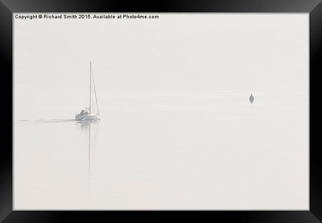 A yacht departs in the mist Framed Print by Richard Smith