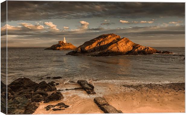  Sunset on Mumbles lighthouse Swansea Canvas Print by Leighton Collins