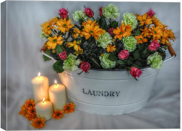  a tub of flowers by candlelight Canvas Print by sue davies
