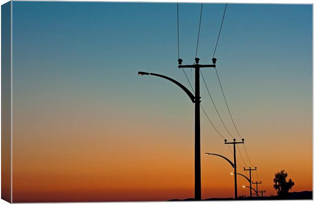 Electric power lines against a dawn sky Canvas Print by ken biggs