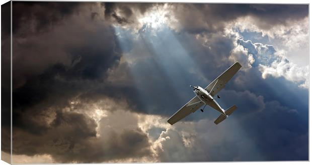 Small fixed wing plane against a stormy sky Canvas Print by ken biggs