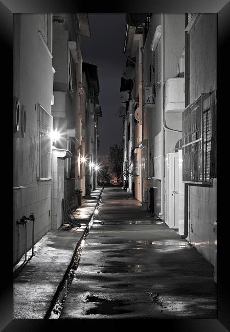 Dark back alley on a wet night Framed Print by ken biggs