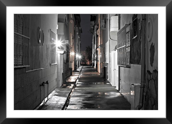 Dark back alley on a wet night Framed Mounted Print by ken biggs