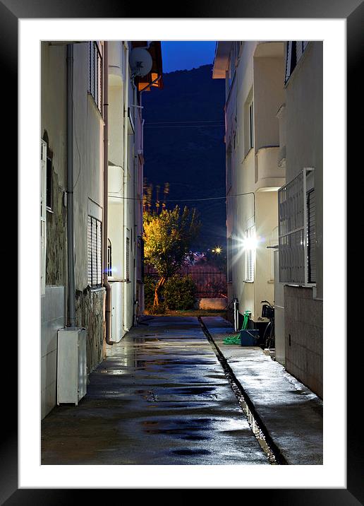 Dark back alley on a wet night Framed Mounted Print by ken biggs