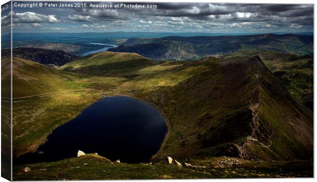  View from the summit of Helvellyn Canvas Print by Peter Jones