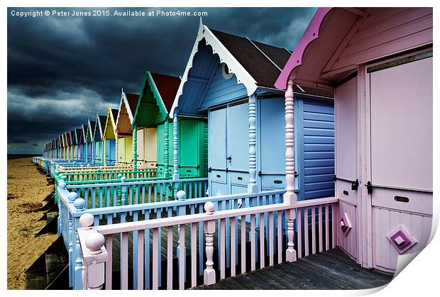  Beach Huts & Storm Clouds Print by Peter Jones