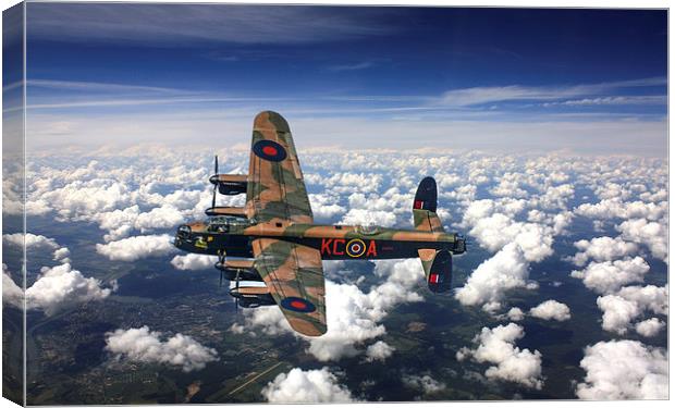  Avro Lancaster bomber above the clouds Canvas Print by Andrew Scott