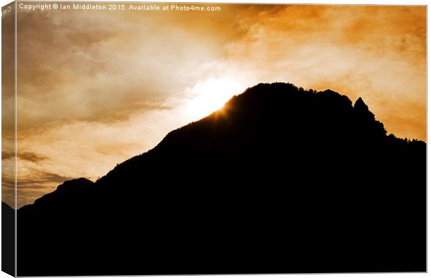 Sunset over hill at Lake Jasna Canvas Print by Ian Middleton