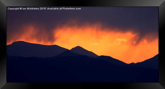 Stormy sunset Framed Print by Ian Middleton