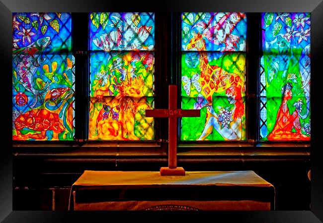 stained glass windows in church with a cross Framed Print by ken biggs