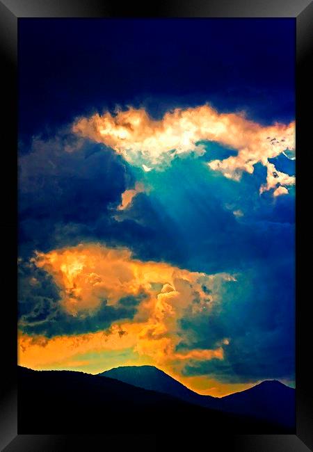 sunrays on a stormy day  Framed Print by ken biggs