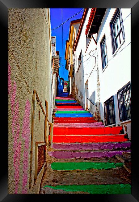 multi colored steps in a Turkish village Framed Print by ken biggs