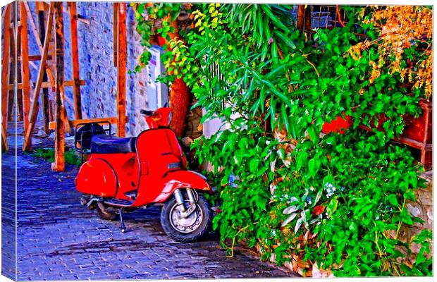  a red scooter in a village street Canvas Print by ken biggs