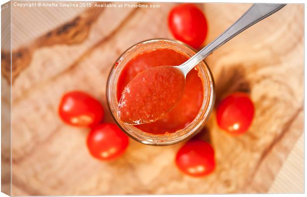 Red homemade tomato ketchup Canvas Print by Arletta Cwalina