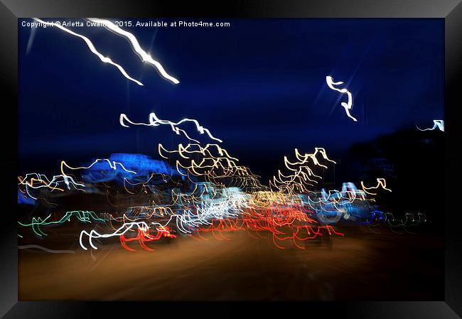 Cars driving motion night lights Framed Print by Arletta Cwalina