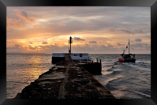  A fishing boat passes the Banjo Pier at Looe Framed Print by Rosie Spooner