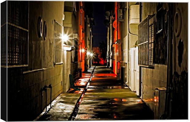 an alley at nightime Canvas Print by ken biggs